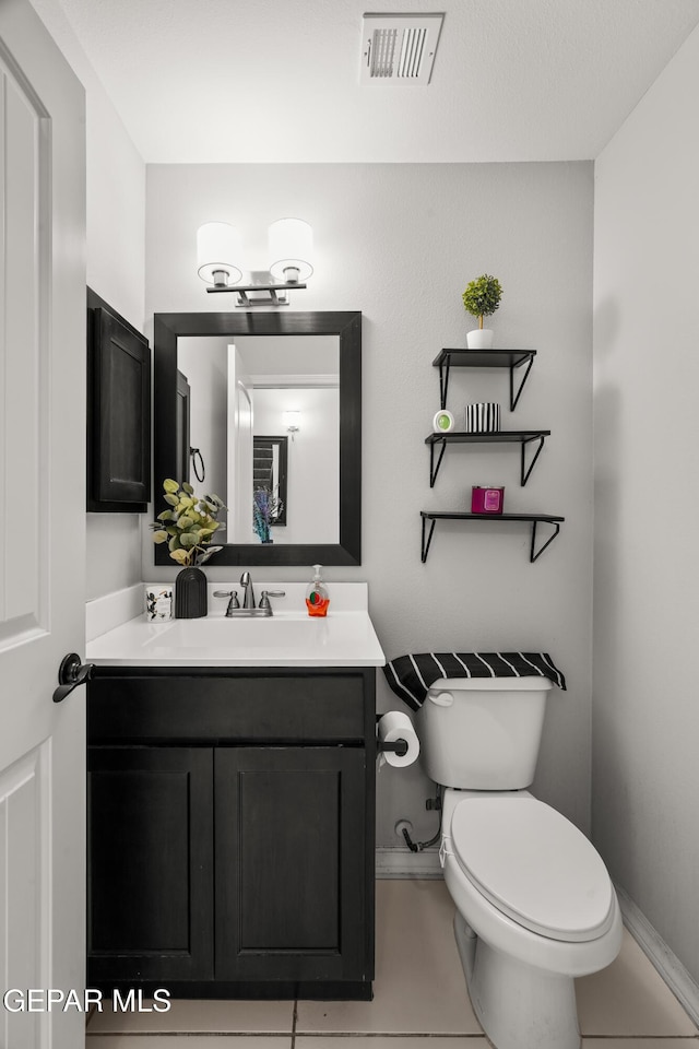 801 Hc Gilbert Minjares Dr Unit A, Socorro, TX 79927 - half bathroom featuring vanity and tile patterned floors