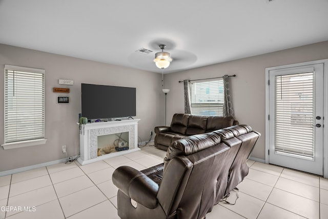 801 Hc Gilbert Minjares Dr Unit A, Socorro, TX 79927 - tiled living room featuring a ceiling fan and baseboards