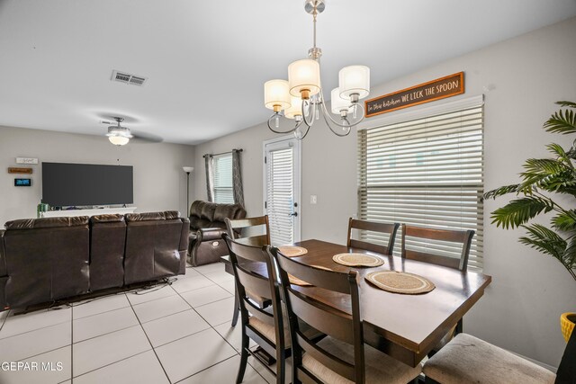 801 Hc Gilbert Minjares Dr Unit A, Socorro, TX 79927 - dining room with light tile patterned floors and a chandelier