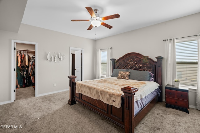 801 Hc Gilbert Minjares Dr Unit A, Socorro, TX 79927 - bedroom with light colored carpet, a walk in closet, and a ceiling fan