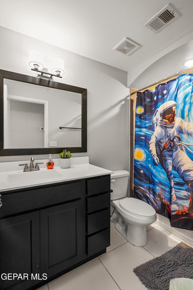 801 Hc Gilbert Minjares Dr Unit A, Socorro, TX 79927 - full bath featuring vanity, tile patterned flooring, and a shower with shower curtain