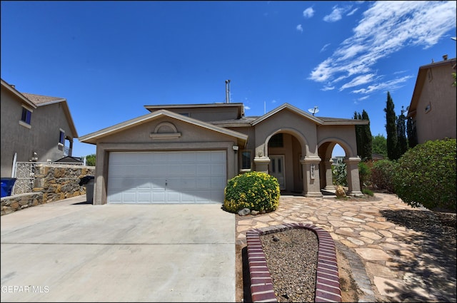 3517 Tierra Bahia Dr, El Paso, TX 79938 - view of front facade featuring concrete driveway, stucco siding, and an attached garage