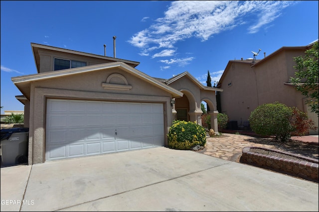 3517 Tierra Bahia Dr, El Paso, TX 79938 - view of front of property featuring stucco siding, concrete driveway, and a garage
