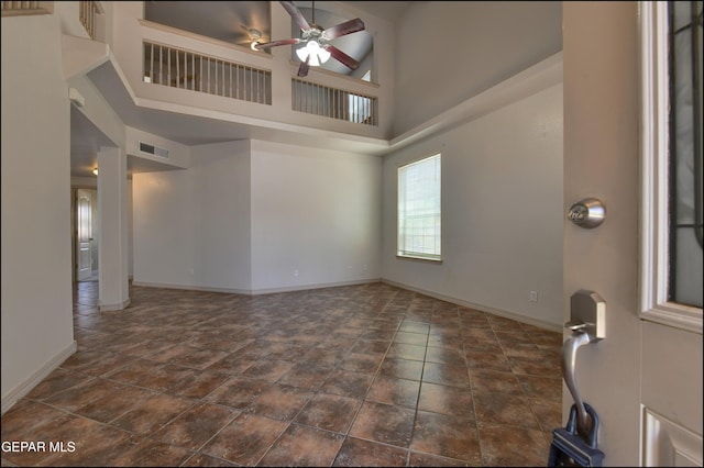 3517 Tierra Bahia Dr, El Paso, TX 79938 - unfurnished room with a ceiling fan and a high ceiling