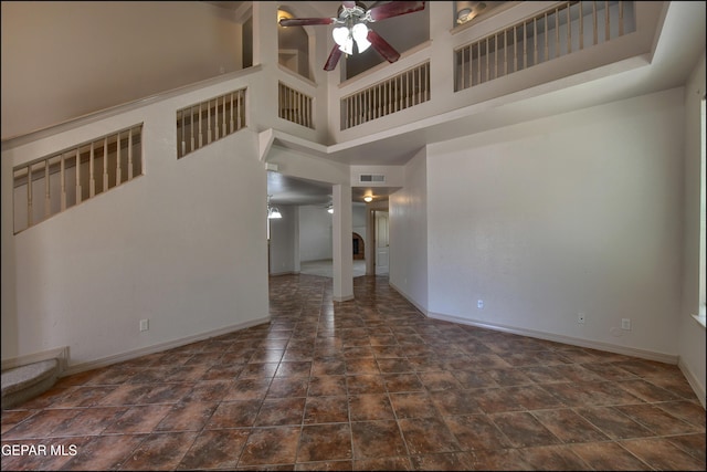 3517 Tierra Bahia Dr, El Paso, TX 79938 - unfurnished living room with a ceiling fan and a high ceiling