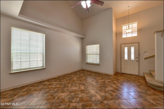 3517 Tierra Bahia Dr, El Paso, TX 79938 - entryway featuring a towering ceiling, a ceiling fan, and stairway