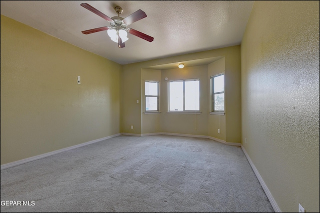 3517 Tierra Bahia Dr, El Paso, TX 79938 - carpeted spare room featuring a ceiling fan and a textured wall