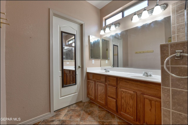 3517 Tierra Bahia Dr, El Paso, TX 79938 - bathroom with double vanity and a textured wall