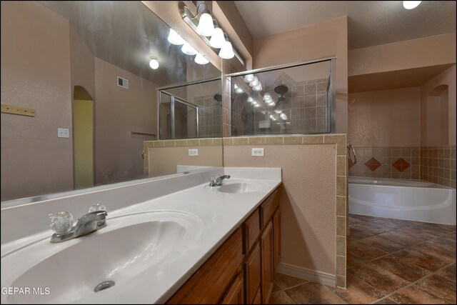 3517 Tierra Bahia Dr, El Paso, TX 79938 - full bathroom with a bath, double vanity, tile patterned floors, and a shower