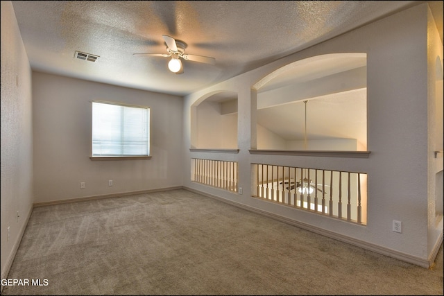 3517 Tierra Bahia Dr, El Paso, TX 79938 - empty room featuring carpet floors, a ceiling fan, and a textured ceiling