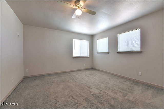 3517 Tierra Bahia Dr, El Paso, TX 79938 - spare room with carpet flooring, a ceiling fan, and a textured ceiling