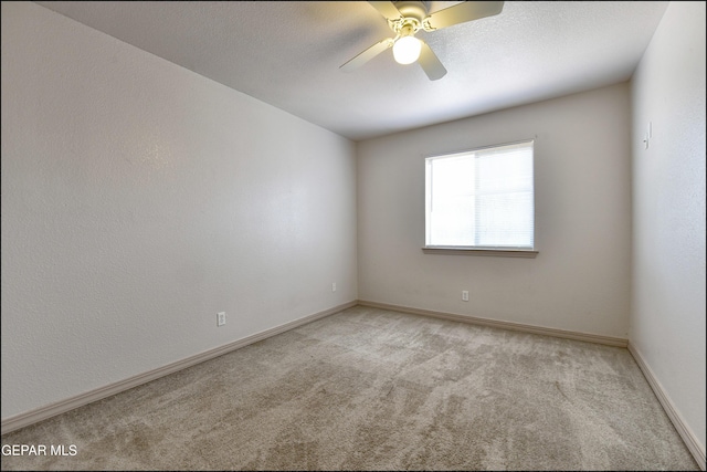 3517 Tierra Bahia Dr, El Paso, TX 79938 - spare room with light colored carpet and a ceiling fan