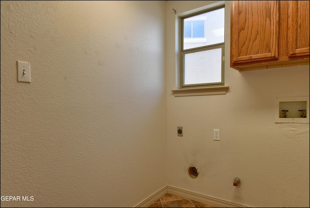 3517 Tierra Bahia Dr, El Paso, TX 79938 - laundry room with cabinet space, hookup for an electric dryer, and washer hookup