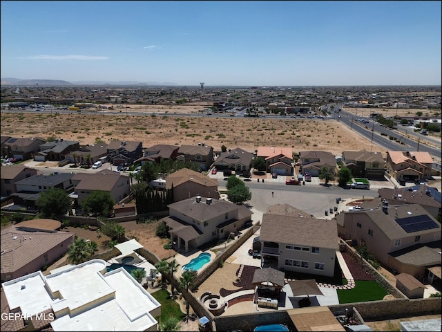 3517 Tierra Bahia Dr, El Paso, TX 79938 - aerial perspective of suburban area with a pool area