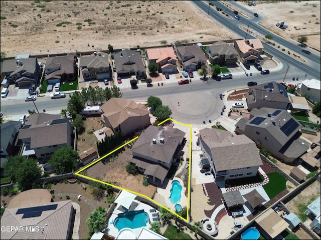 3517 Tierra Bahia Dr, El Paso, TX 79938 - aerial perspective of suburban area featuring property boundaries highlighted and a pool