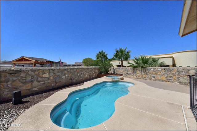 3517 Tierra Bahia Dr, El Paso, TX 79938 - view of swimming pool with a pool with connected hot tub and a patio