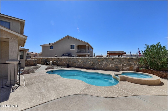 3517 Tierra Bahia Dr, El Paso, TX 79938 - view of pool featuring a pool with connected hot tub, a patio area, and a fenced backyard