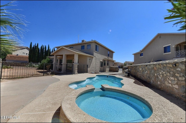 3517 Tierra Bahia Dr, El Paso, TX 79938 - view of pool with a pool with connected hot tub and a patio area
