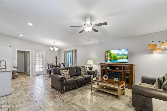 14744 Charles Foster Ave, El Paso, TX 79938 - living room with a chandelier, a ceiling fan, and lofted ceiling