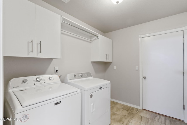 14744 Charles Foster Ave, El Paso, TX 79938 - laundry area with cabinet space and separate washer and dryer