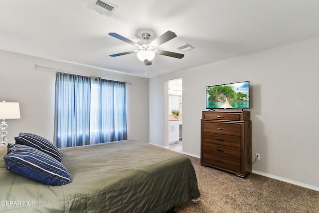 14744 Charles Foster Ave, El Paso, TX 79938 - carpeted bedroom with a ceiling fan and connected bathroom
