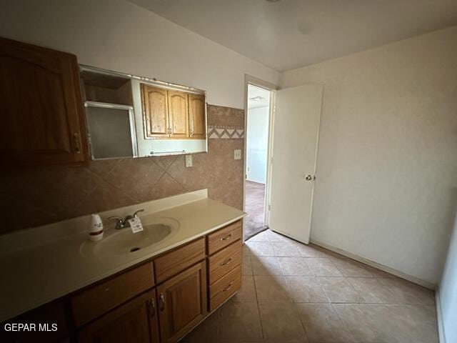 209 Durrill Rd, El Paso, TX 79915 - bathroom featuring vanity, tile patterned flooring, and a shower with door