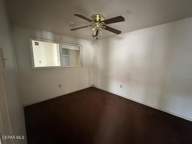 209 Durrill Rd, El Paso, TX 79915 - empty room with a ceiling fan and dark carpet