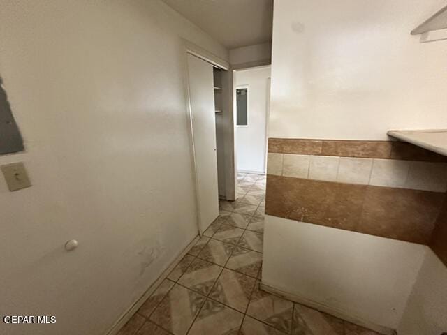209 Durrill Rd, El Paso, TX 79915 - hall with light tile patterned floors
