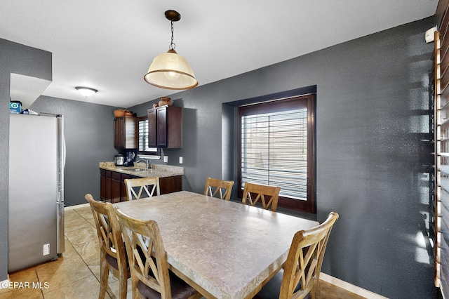 4640 Beacham St, El Paso, TX 79938 - dining room featuring plenty of natural light and light tile patterned flooring