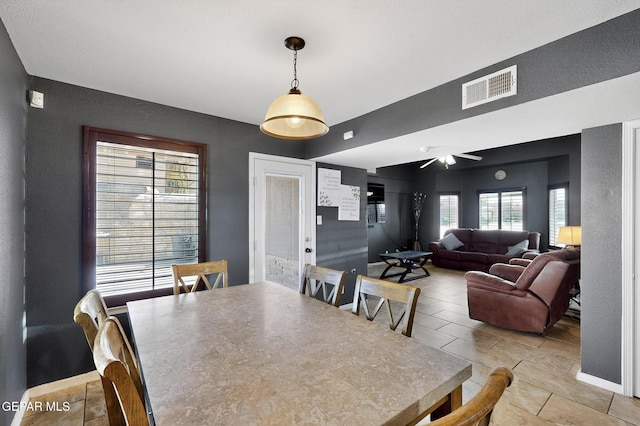 4640 Beacham St, El Paso, TX 79938 - dining room featuring ceiling fan and baseboards