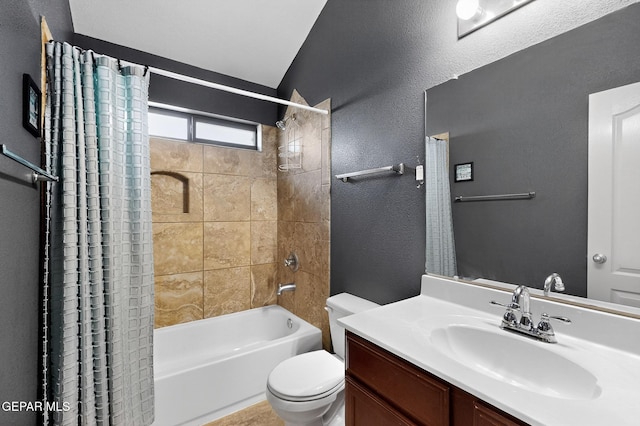 4640 Beacham St, El Paso, TX 79938 - bathroom with shower / tub combo, vanity, a textured wall, and vaulted ceiling