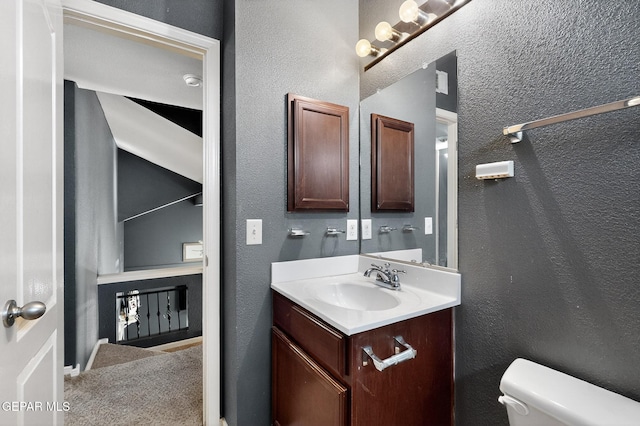 4640 Beacham St, El Paso, TX 79938 - half bath with vanity and a textured wall