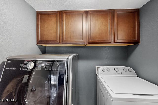 4640 Beacham St, El Paso, TX 79938 - laundry room featuring washer and dryer and cabinet space
