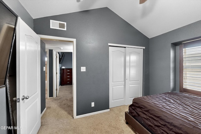 4640 Beacham St, El Paso, TX 79938 - bedroom featuring lofted ceiling, light carpet, a closet, and a ceiling fan