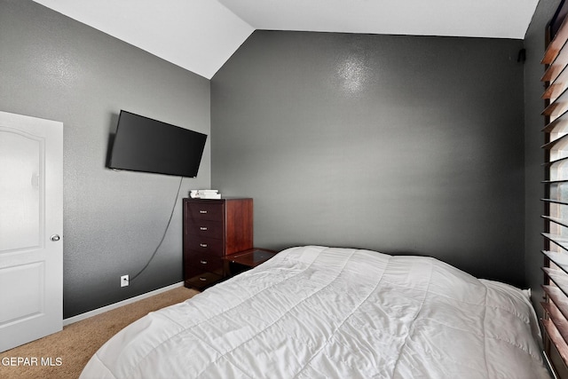 4640 Beacham St, El Paso, TX 79938 - carpeted bedroom with lofted ceiling and baseboards