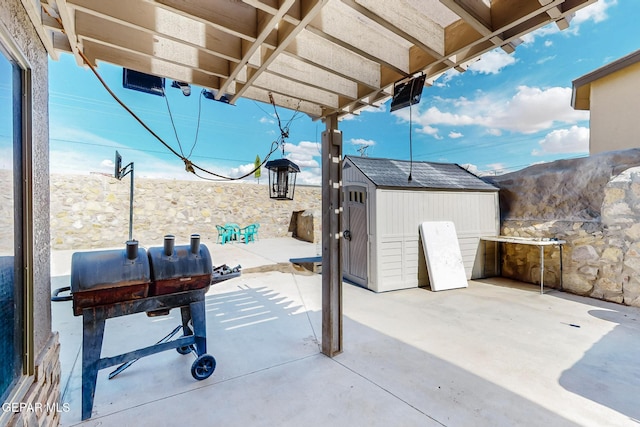 4640 Beacham St, El Paso, TX 79938 - view of patio / terrace featuring a shed and a grill