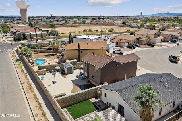 4640 Beacham St, El Paso, TX 79938 - aerial perspective of suburban area featuring mountains and a pool