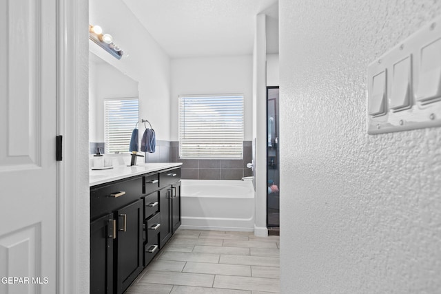 12334 Westbury, El Paso, TX 79928 - full bath with vanity and a bath