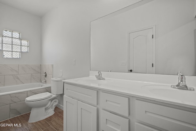 224 Penbridge Pl, El Paso, TX 79928 - full bathroom featuring double vanity, a tub, and wood finished floors