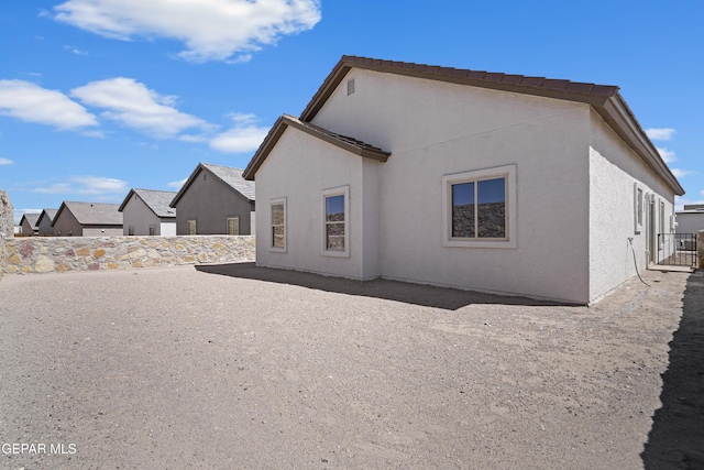 224 Penbridge Pl, El Paso, TX 79928 - rear view of house with stucco siding