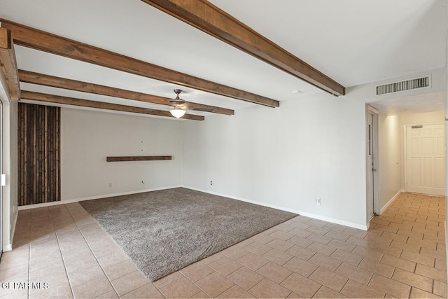 1615 Opossum Cir, Horizon City, TX 79928 - tiled spare room with ceiling fan, carpet, and beamed ceiling