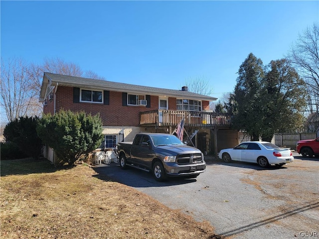 view of front of house with a wooden deck