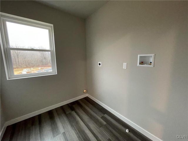 laundry room featuring hookup for an electric dryer, washer hookup, and dark hardwood / wood-style floors