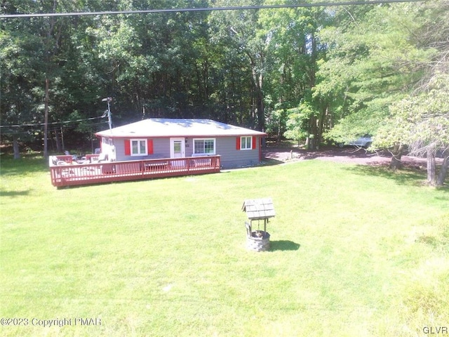 view of yard with a deck