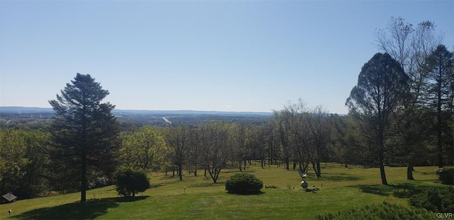 property view of mountains featuring a rural view