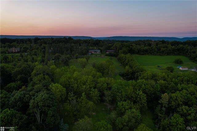 view of aerial view at dusk