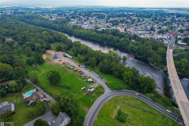 view of property location with a nearby body of water, a major roadway, and a notable bridge