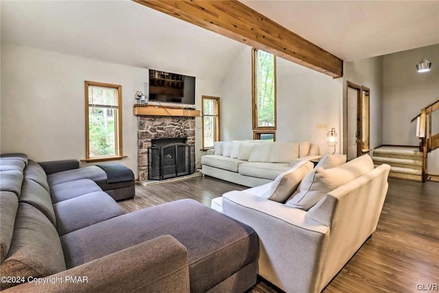 living room featuring a fireplace, beam ceiling, and dark hardwood / wood-style flooring