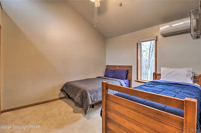 carpeted bedroom featuring vaulted ceiling, ceiling fan, and a wall mounted air conditioner