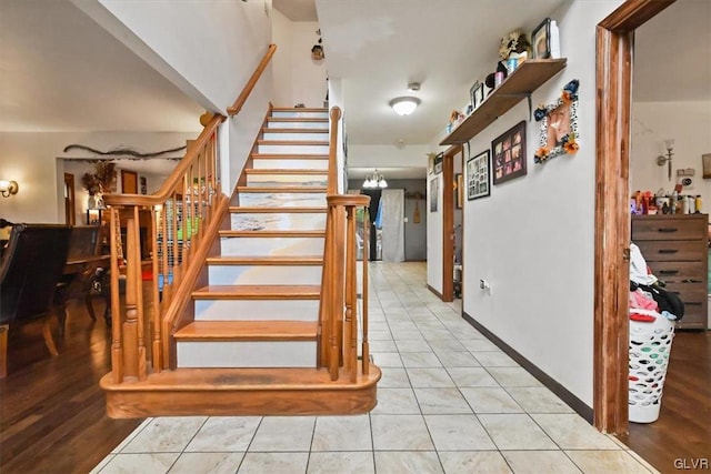 stairs with wood-type flooring